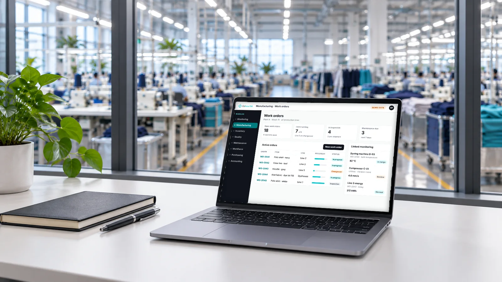 Laptop in a factory office showing a work orders screen with linked monitoring readings